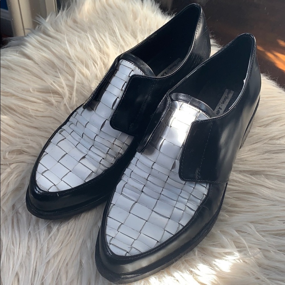 Black and white leather Oxfords